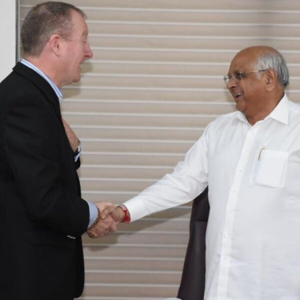 Gujarat Chief Minister Felicitates QX Global Group